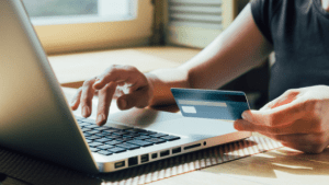 woman paying online using credit card
